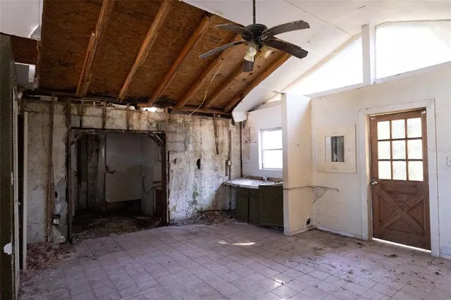 an empty room with windows