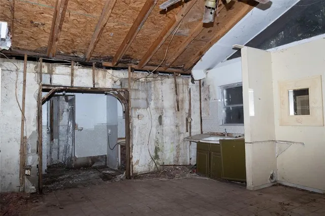 a view of empty room with windows