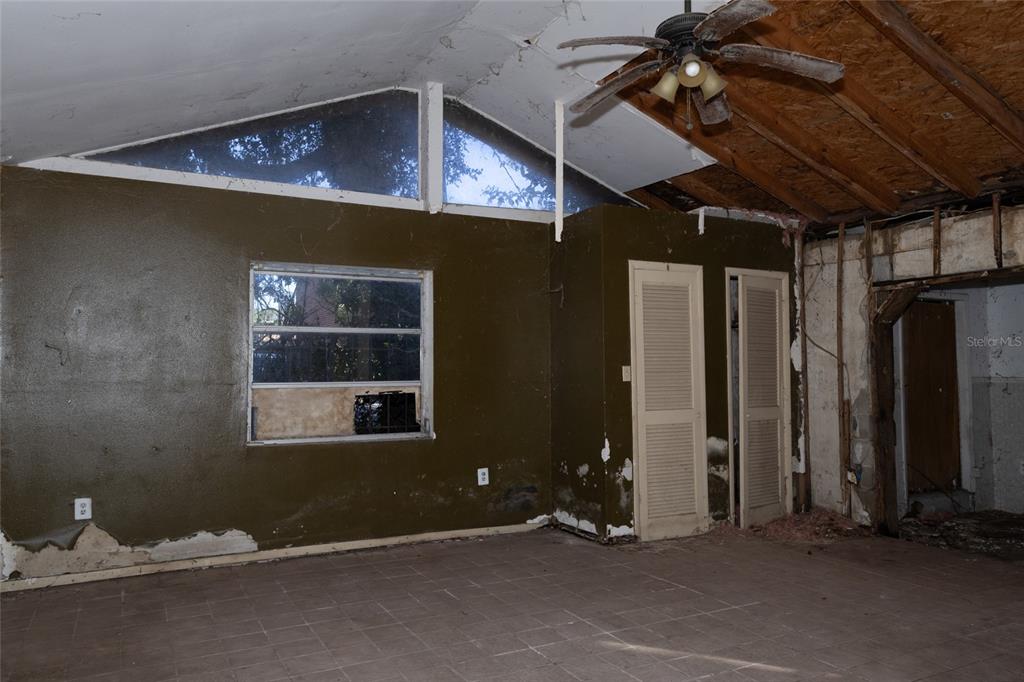 4711 Rio Grande Avenue Orlando, FL 32839 - Photo 20 of 38 an empty room with windows