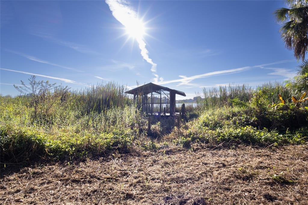 4711 Rio Grande Avenue Orlando, FL 32839 - Photo 10 of 38 a view of a pathway both side of grassy field