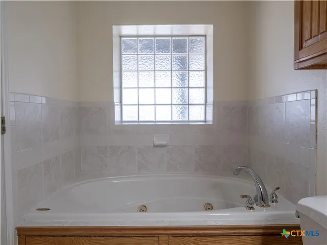 a bathroom with a bathtub