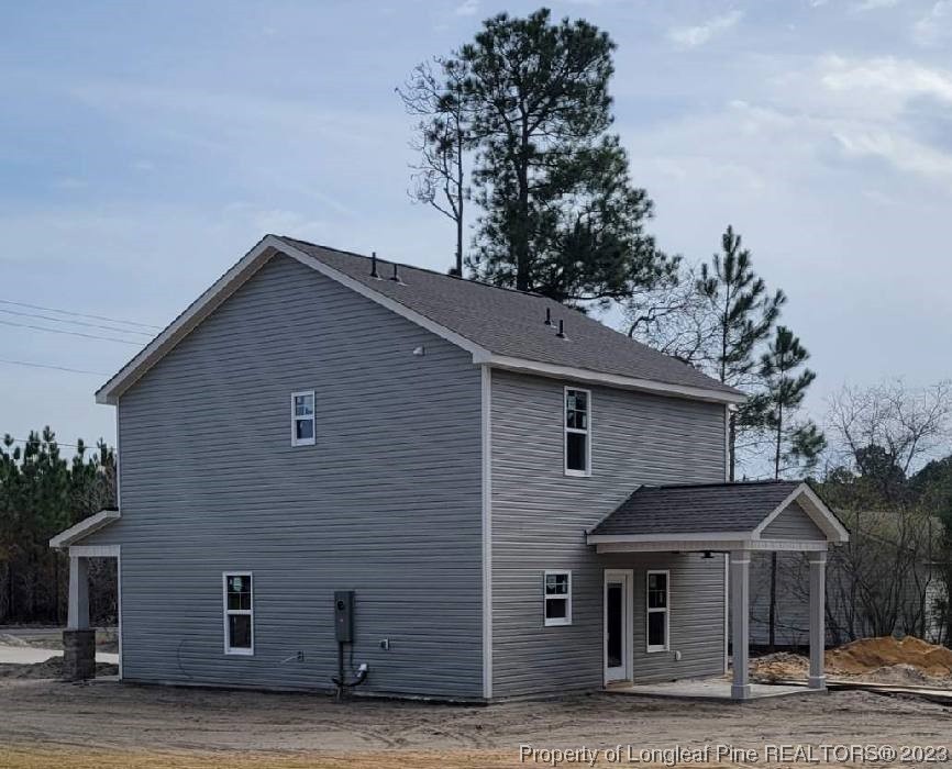 2558 Marks Road Cameron, NC 28326 - Photo 2 of 6 a front view of house with yard