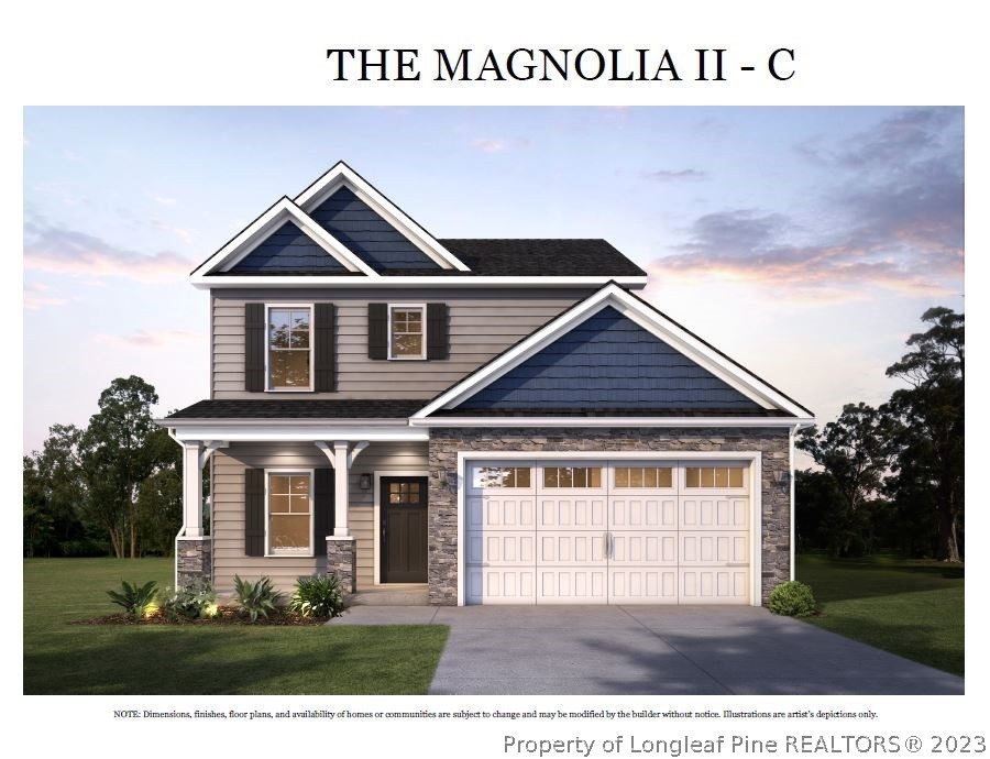 2558 Marks Road Cameron, NC 28326 - Photo 3 of 6 a front view of a house with a yard and garage