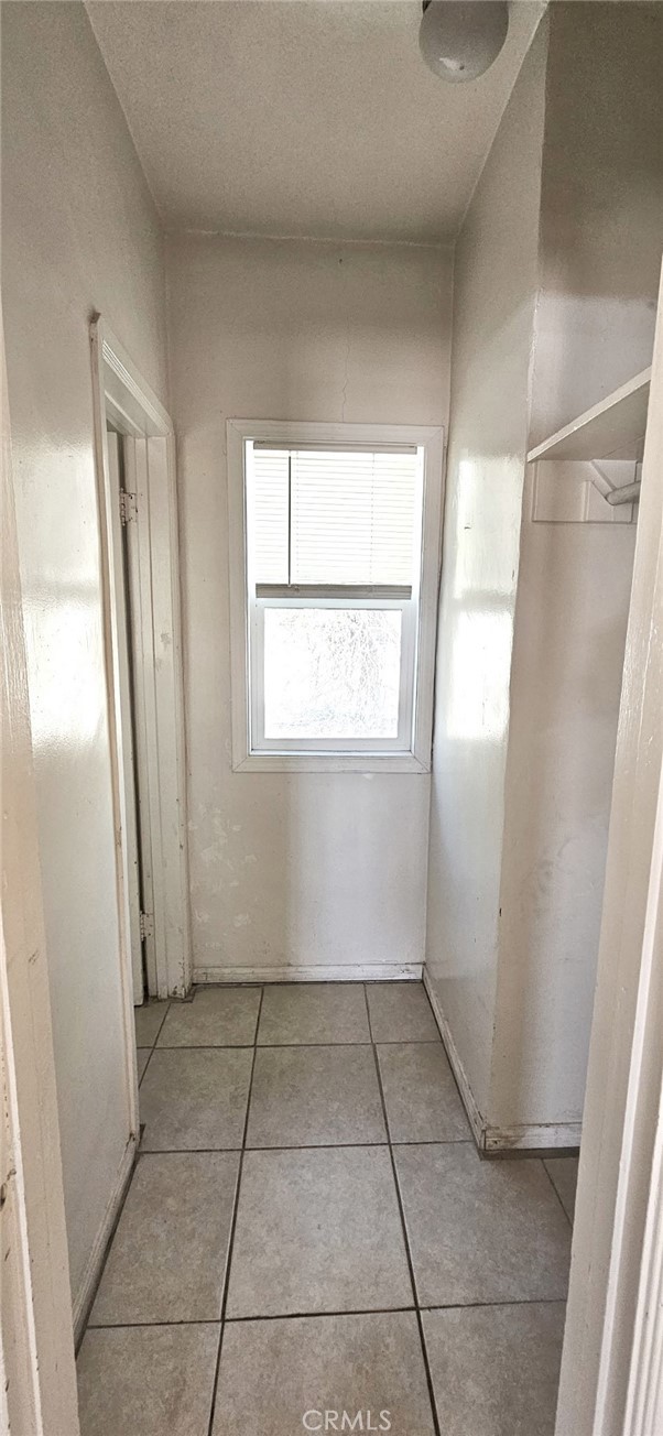 6555 Indian Cove Road Twentynine Palms, CA 92277 - Photo 11 of 14 a view of a utility room with a window