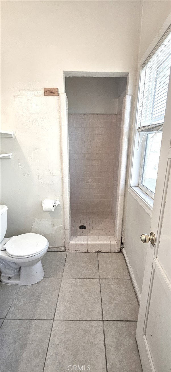 6555 Indian Cove Road Twentynine Palms, CA 92277 - Photo 13 of 14 a bathroom with a toilet and a shower