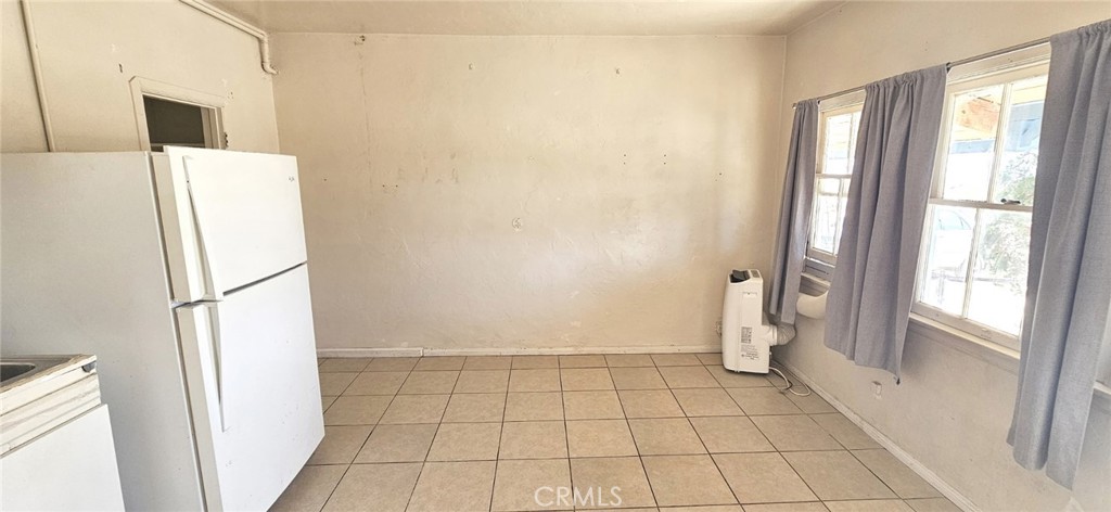 6555 Indian Cove Road Twentynine Palms, CA 92277 - Photo 10 of 14 a view of an empty room with a window