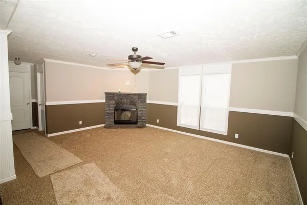 a view of a room with closet and windows