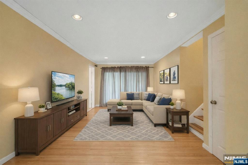 9 Hemlock Drive Paramus, NJ 07652 - Photo 14 of 35 a living room with furniture and a flat screen tv