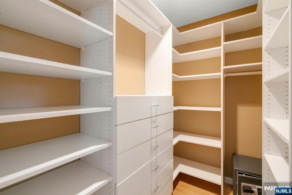 9 Hemlock Drive Paramus, NJ 07652 - Photo 21 of 35 a view of walk in closet with empty racks