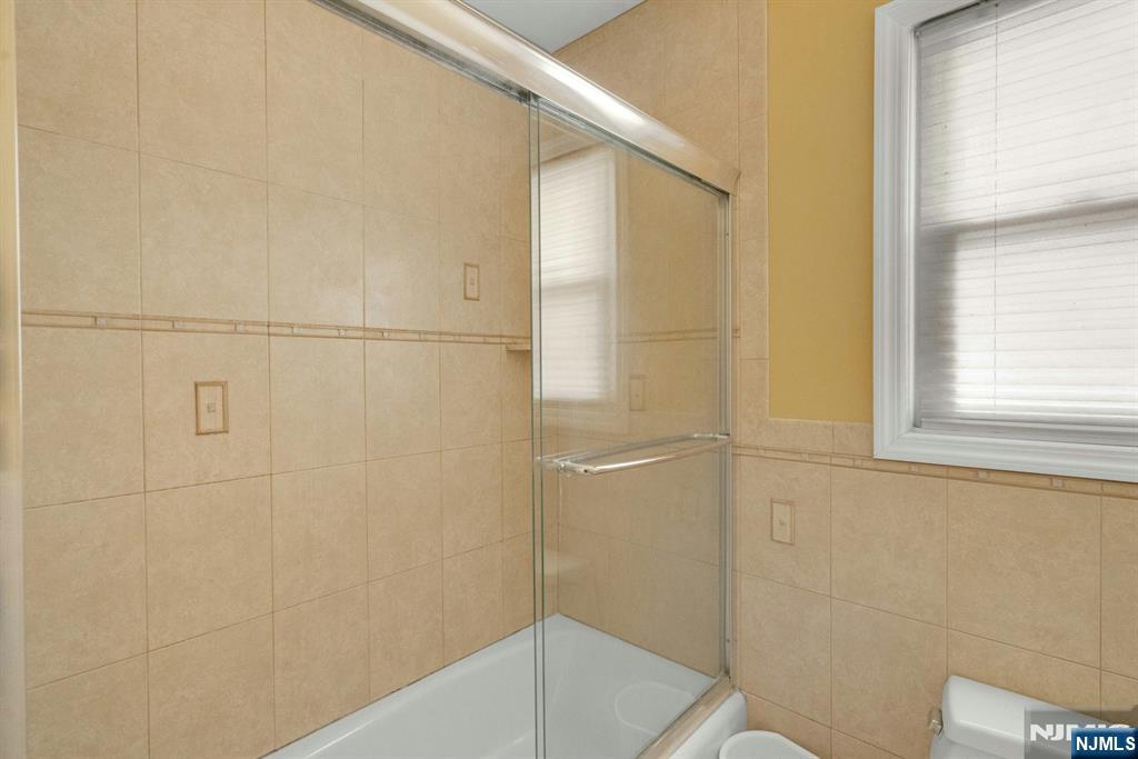 9 Hemlock Drive Paramus, NJ 07652 - Photo 23 of 35 a bathroom with a shower