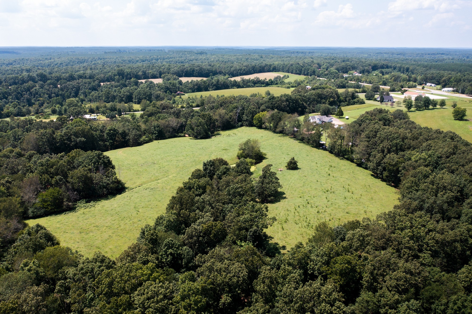 159 Trace Creek Road Hohenwald, TN 38462 - Photo 32 of 42 an aerial view of a house with a yard