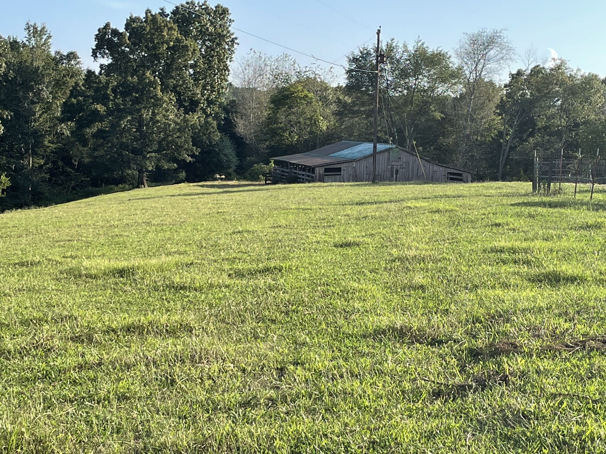 159 Trace Creek Road Hohenwald, TN 38462 - Photo 40 of 42 a swimming pool with outdoor seating and yard