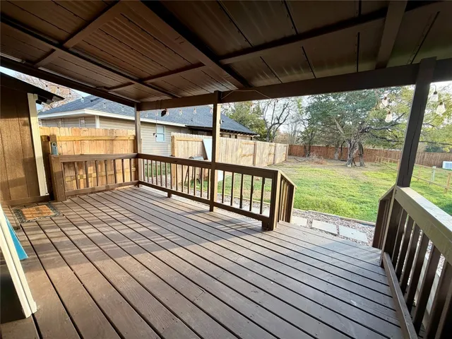 a view of a backyard of the house