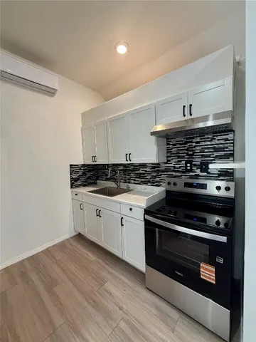 a utility room with washer and dryer