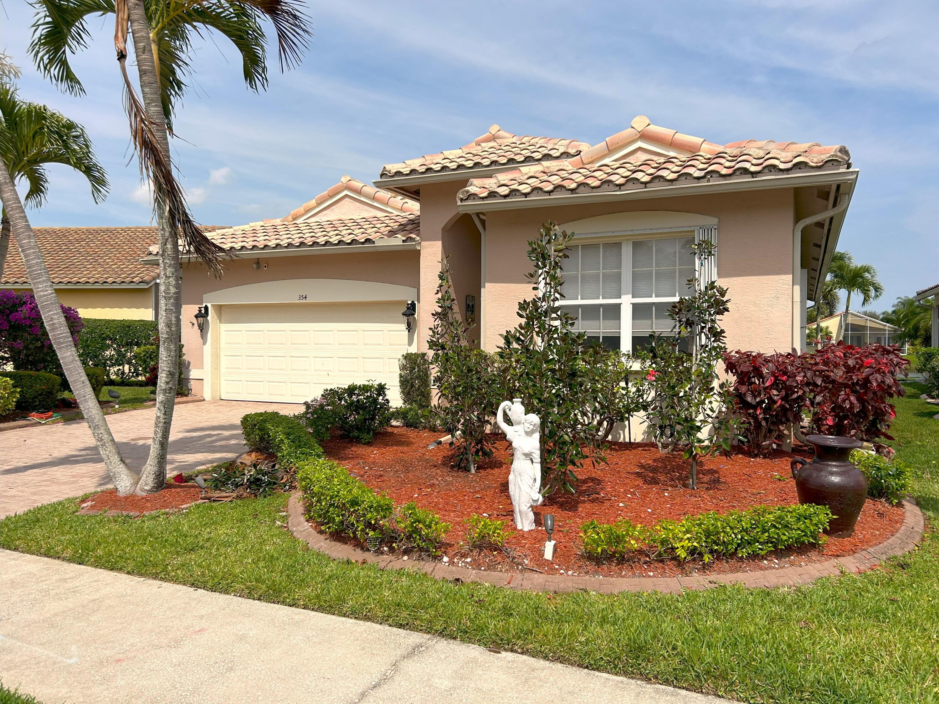 354 Springview Loop Port St. Lucie, FL 34986 - Photo 3 of 88 Front 1