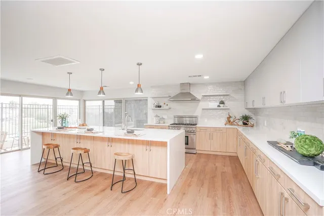 a bathroom with a shower and a sink