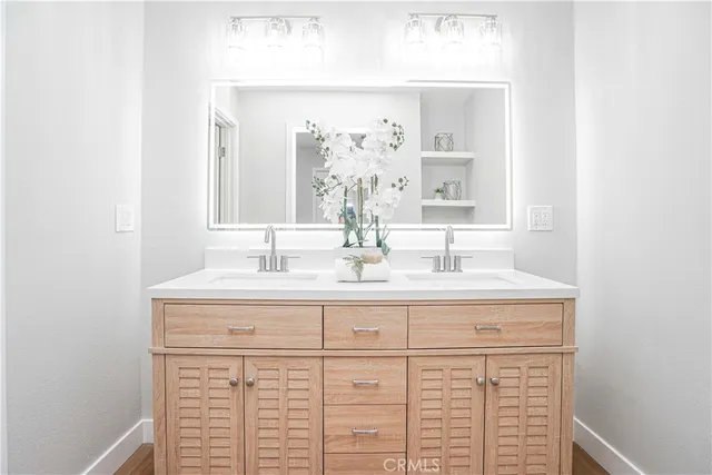 a living room with furniture and a glass door