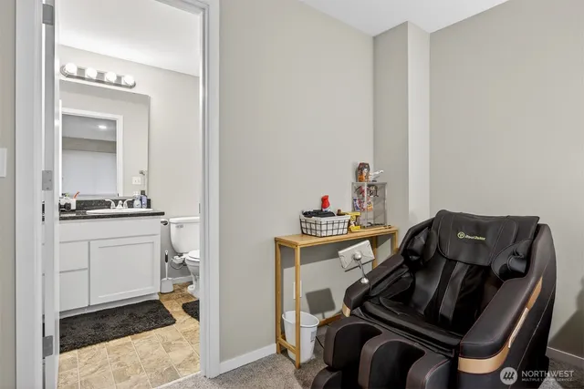 a backyard of a house with lots of green space and wooden fence
