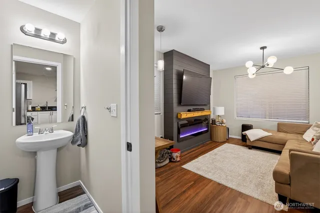 a en suite bathroom with a sink and a mirror