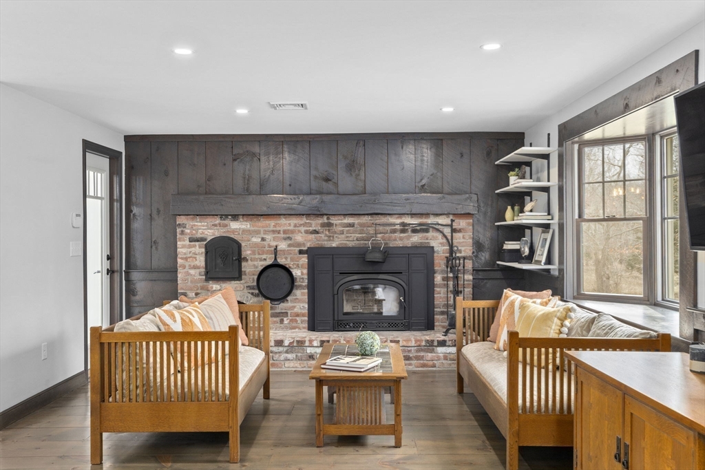 19 Kathy's Path Scituate, MA 02066 - Photo 11 of 41 a living room with furniture and a fireplace