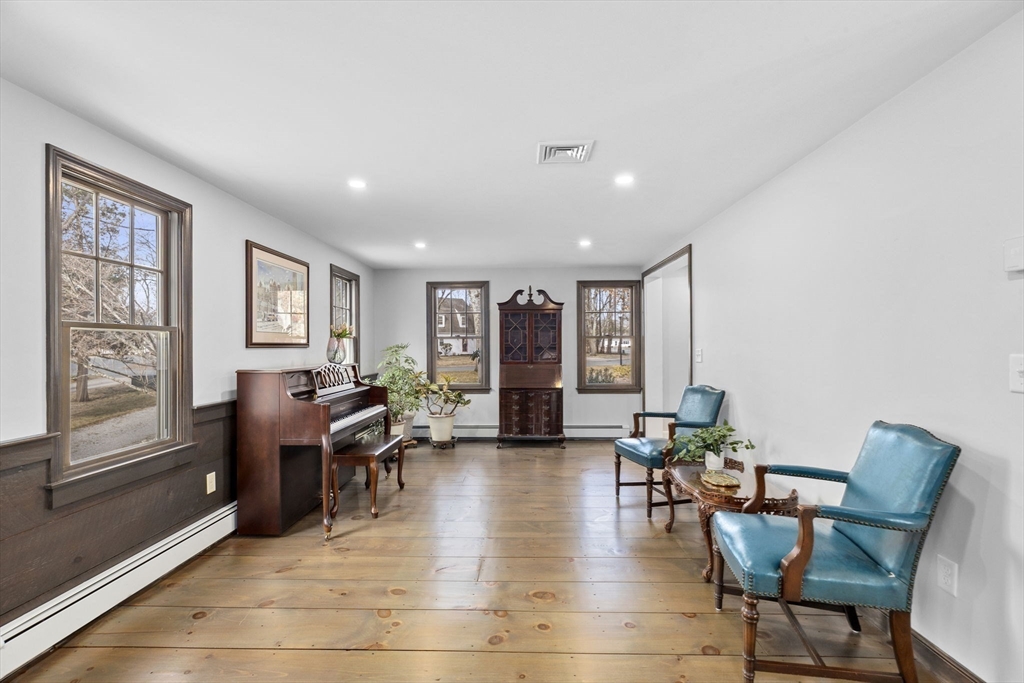 19 Kathy's Path Scituate, MA 02066 - Photo 13 of 41 a living room with furniture and wooden floor
