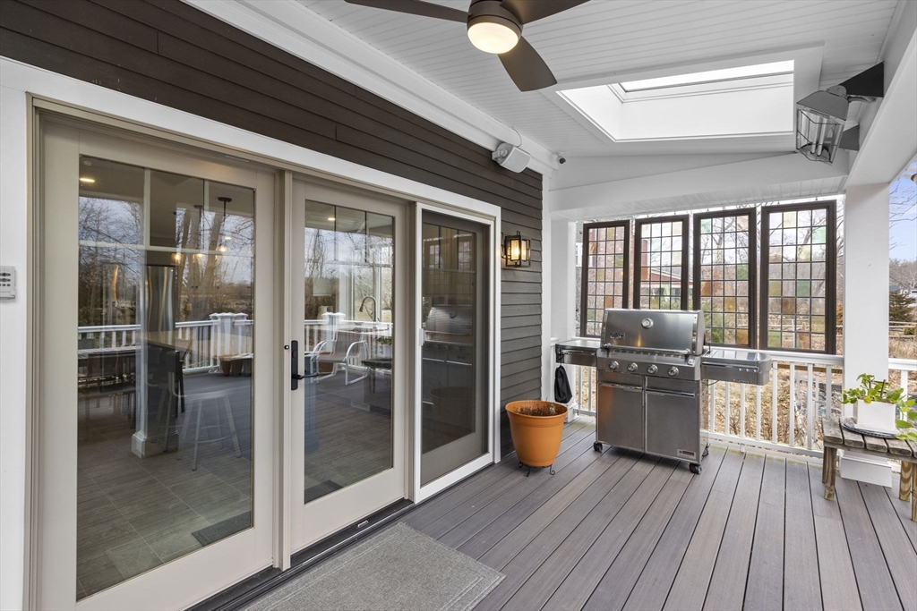 19 Kathy's Path Scituate, MA 02066 - Photo 14 of 41 a kitchen with stainless steel appliances granite countertop a refrigerator a stove and a wooden floors