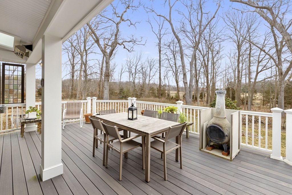 19 Kathy's Path Scituate, MA 02066 - Photo 16 of 41 a view of a house with backyard and sitting area