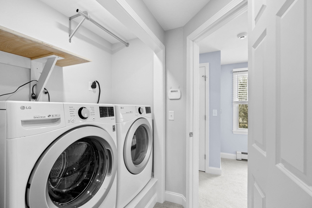 19 Kathy's Path Scituate, MA 02066 - Photo 23 of 41 a view of a hallway with washer and dryer