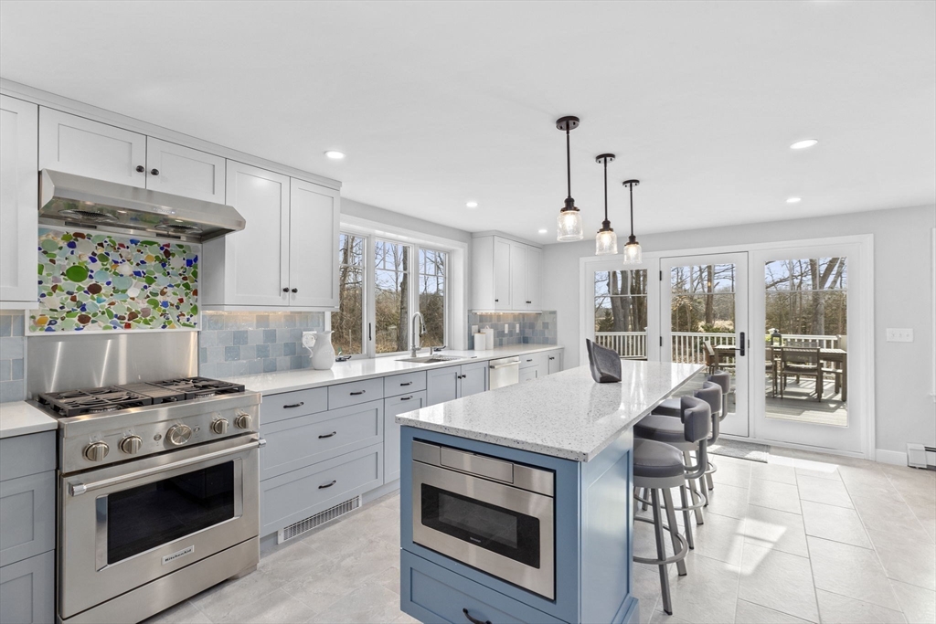 19 Kathy's Path Scituate, MA 02066 - Photo 6 of 41 a kitchen with a stove a sink and a refrigerator