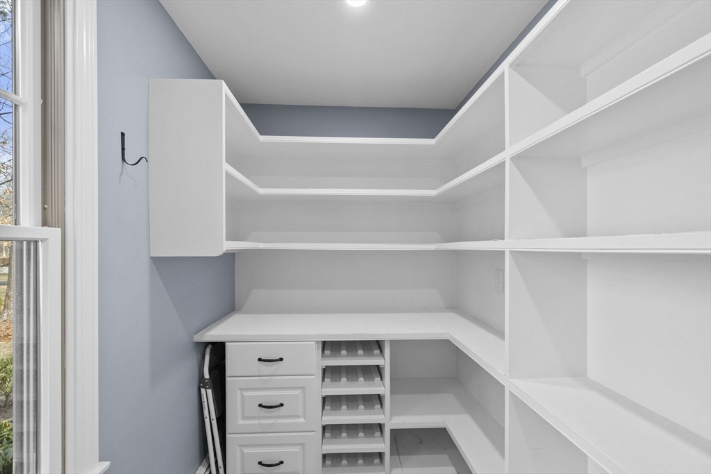 19 Kathy's Path Scituate, MA 02066 - Photo 8 of 41 a view of walk in closet with empty racks