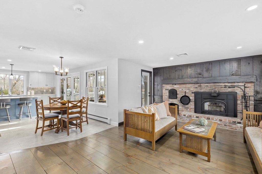 19 Kathy's Path Scituate, MA 02066 - Photo 10 of 41 a living room with furniture and a fireplace