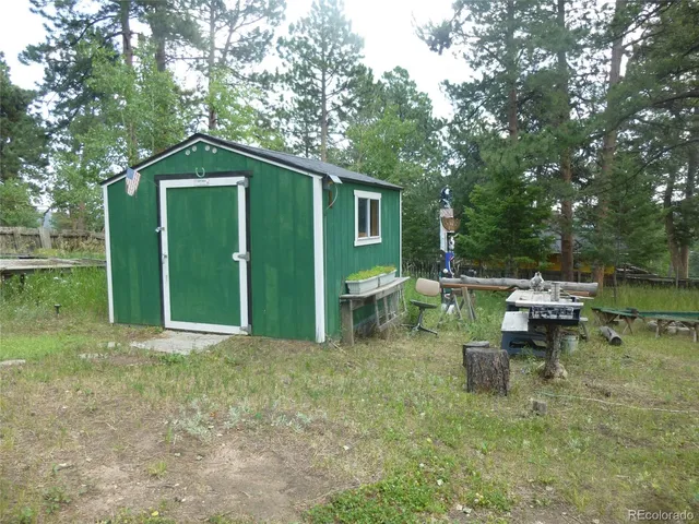 a backyard of a house with seating space