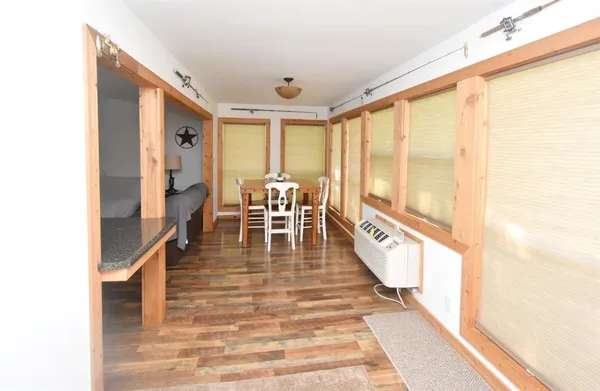 a view of a living room with a large window