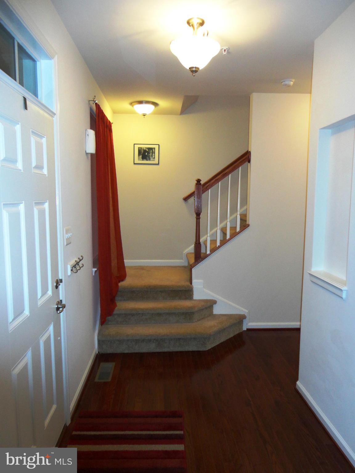 14302 Lusby Ridge Road Accokeek, MD 20607 - Photo 13 of 30 Front Foyer to Staircase