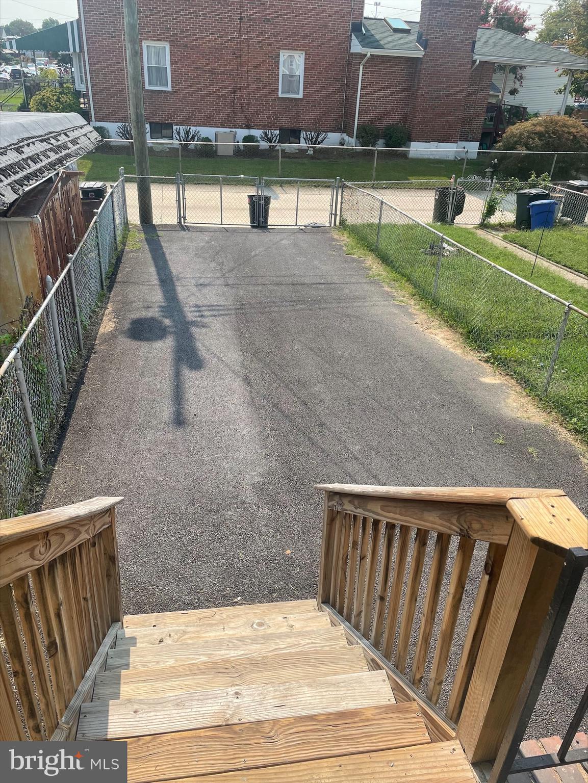 429 Oakwood Road Dundalk, MD 21222 - Photo 12 of 27 a view of swimming pool with outdoor seating and yard