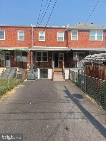 a front view of a building with street