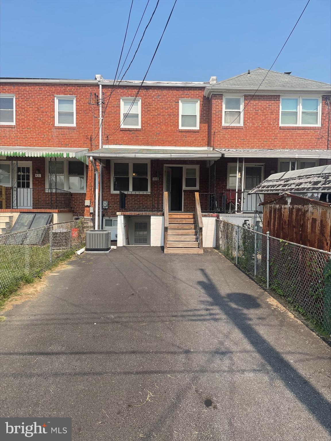 429 Oakwood Road Dundalk, MD 21222 - Photo 2 of 27 a front view of a building with street