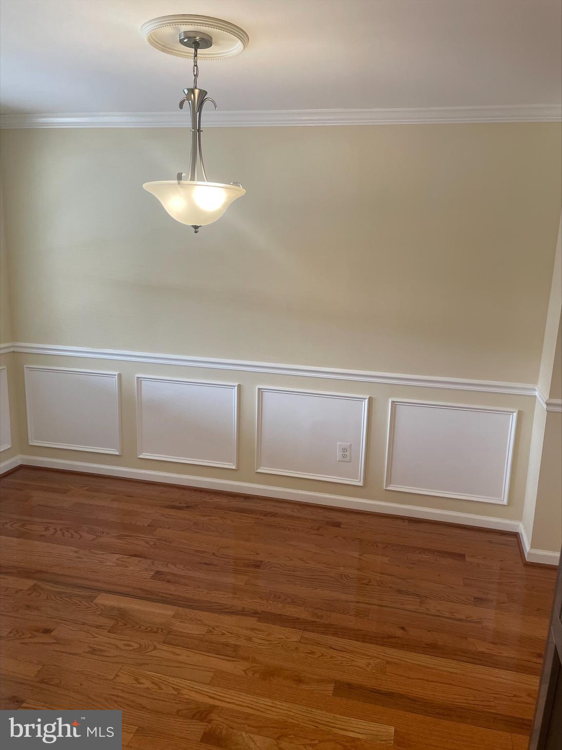 429 Oakwood Road Dundalk, MD 21222 - Photo 21 of 27 a view of wooden floor and chandelier in a room