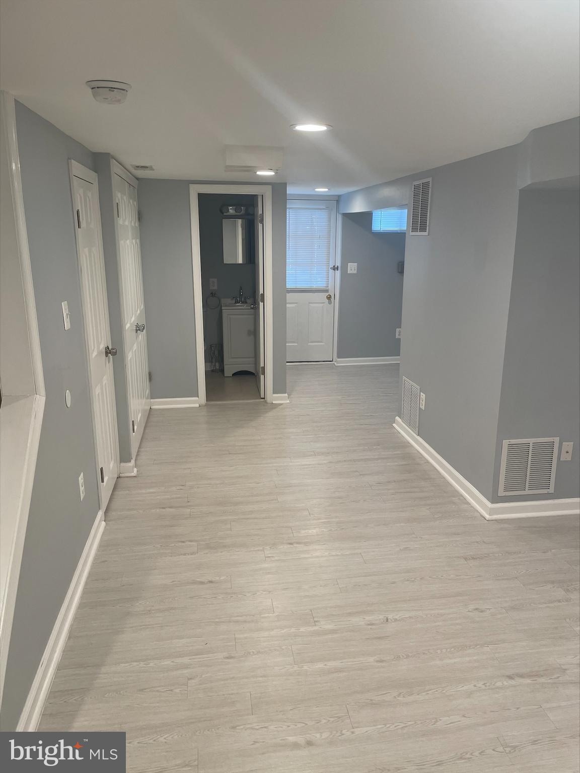 429 Oakwood Road Dundalk, MD 21222 - Photo 27 of 27 a view of an empty room with wooden floor