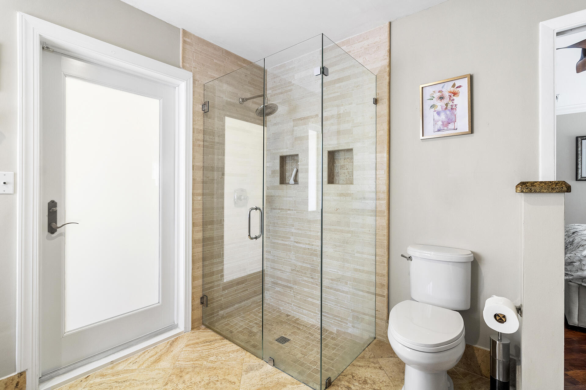 2530 Northwest 40th Street Boca Raton, FL 33434 - Photo 12 of 35 a bathroom with a toilet and a shower