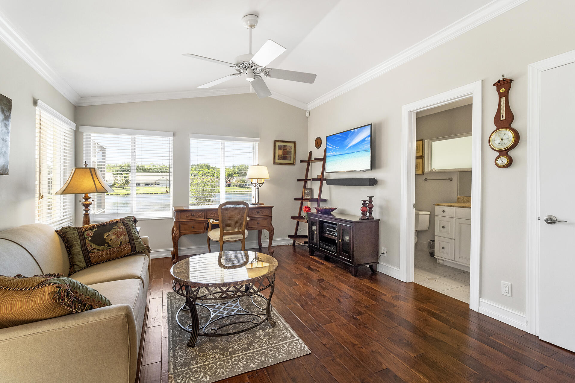 2530 Northwest 40th Street Boca Raton, FL 33434 - Photo 22 of 35 a living room with furniture and wooden floor
