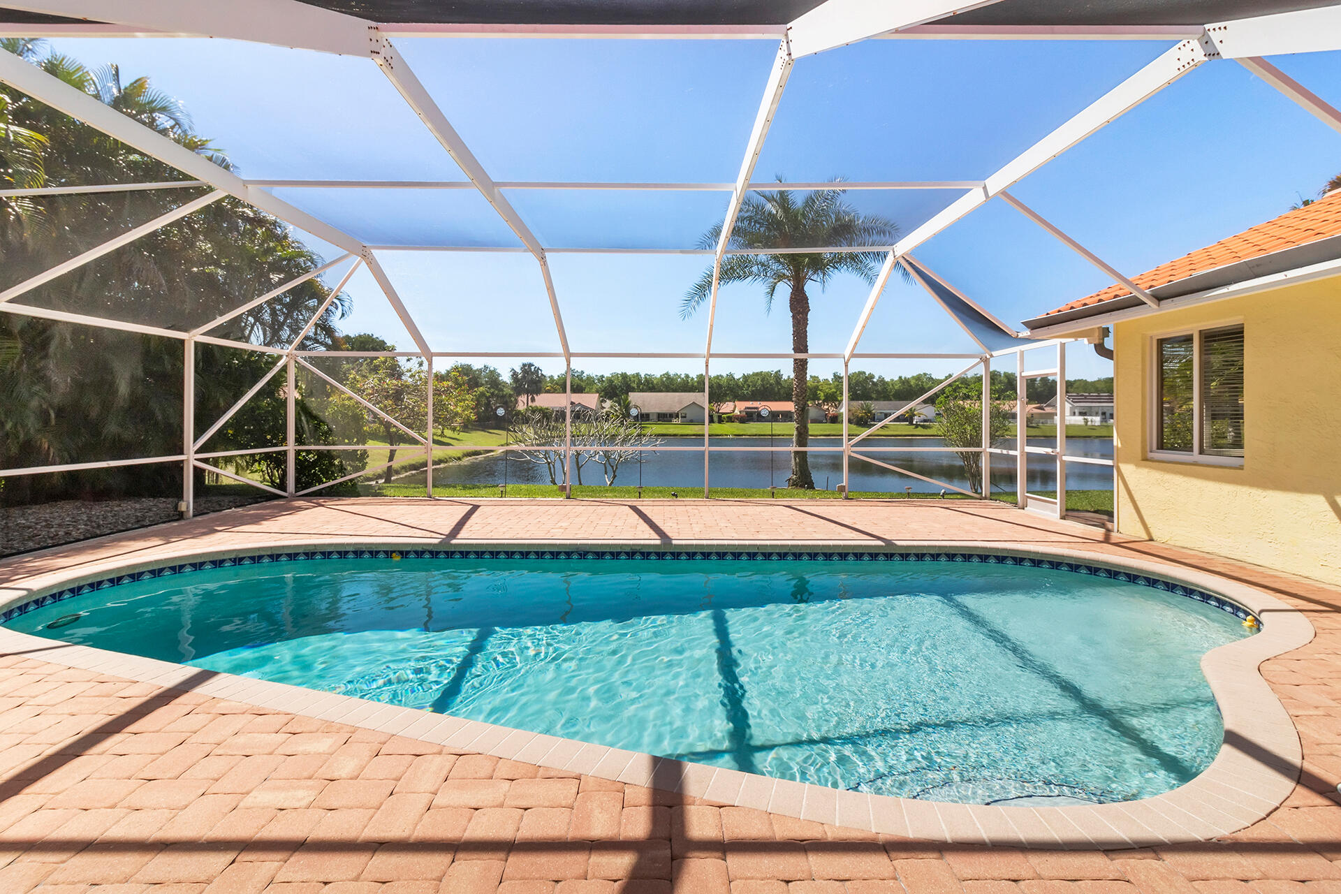 2530 Northwest 40th Street Boca Raton, FL 33434 - Photo 3 of 35 a view of a backyard with swimming pool
