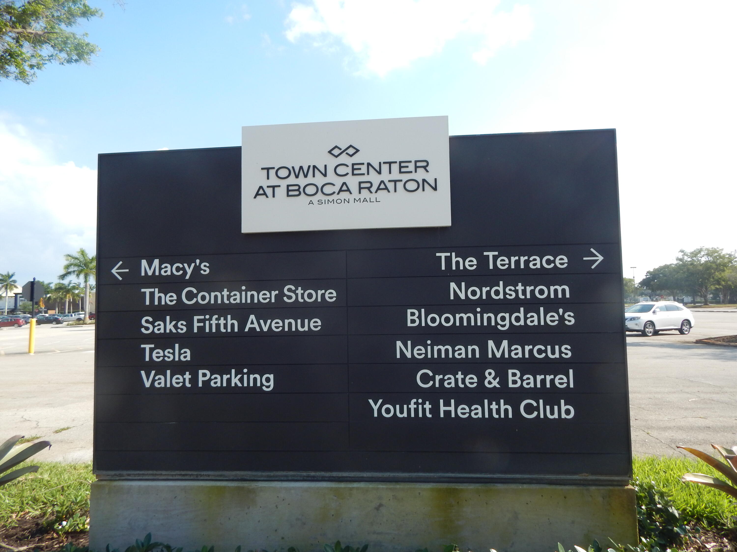 2530 Northwest 40th Street Boca Raton, FL 33434 - Photo 34 of 35 a sign that is sitting on a wooden wall