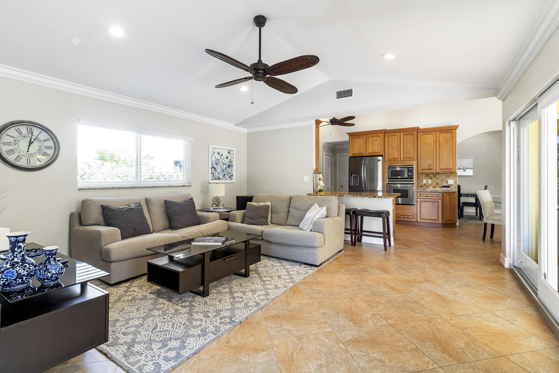 2530 Northwest 40th Street Boca Raton, FL 33434 - Photo 6 of 35 a living room with furniture and a large window