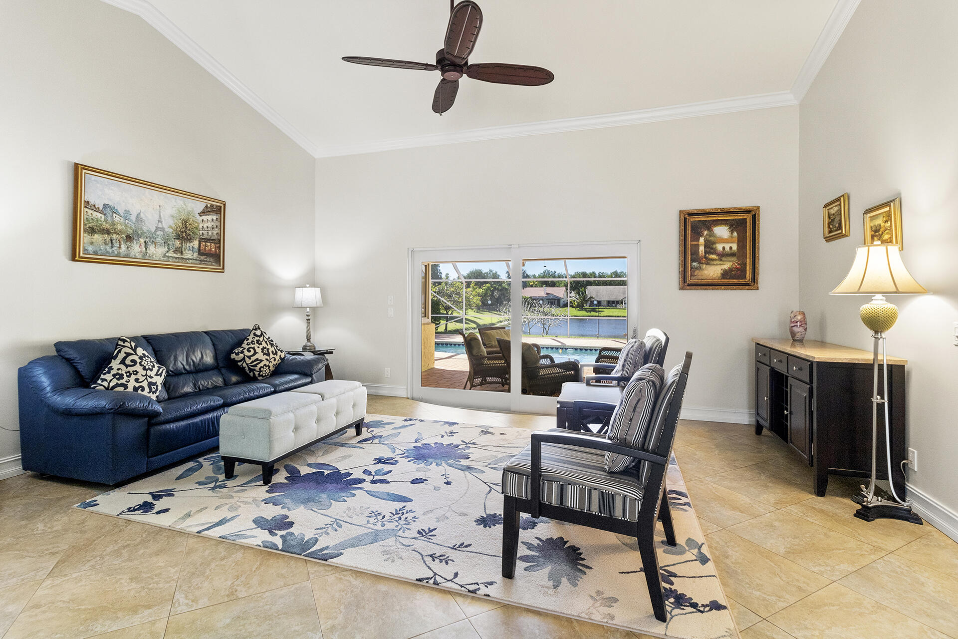 2530 Northwest 40th Street Boca Raton, FL 33434 - Photo 8 of 35 a living room with furniture and a window