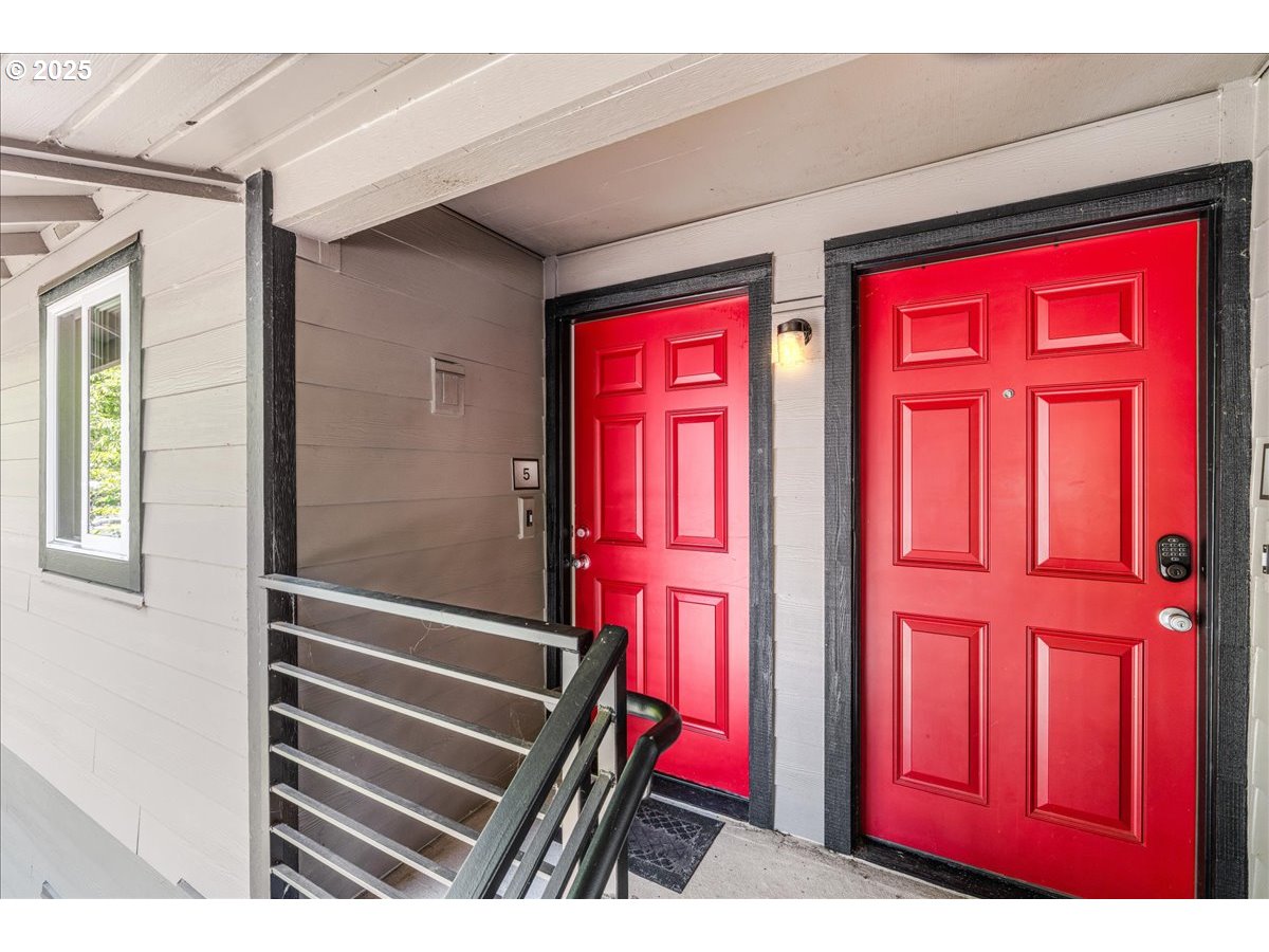 12620 Northwest Barnes Road, Unit 5 Portland, OR 97229 - Photo 2 of 26 a view of front door with a red door