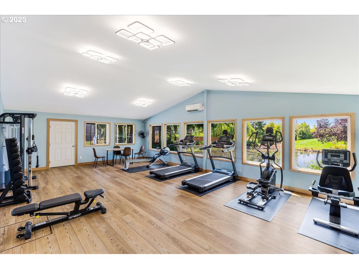 12620 Northwest Barnes Road, Unit 5 Portland, OR 97229 - Photo 23 of 26 a view of a room with gym equipment