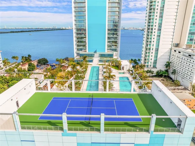 a view of swimming pool with a yard