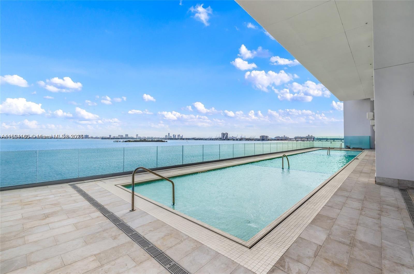 700 Northeast 26th Terrace, Unit 3903 Miami, FL 33137 - Photo 35 of 42 a view of swimming pool with a yard