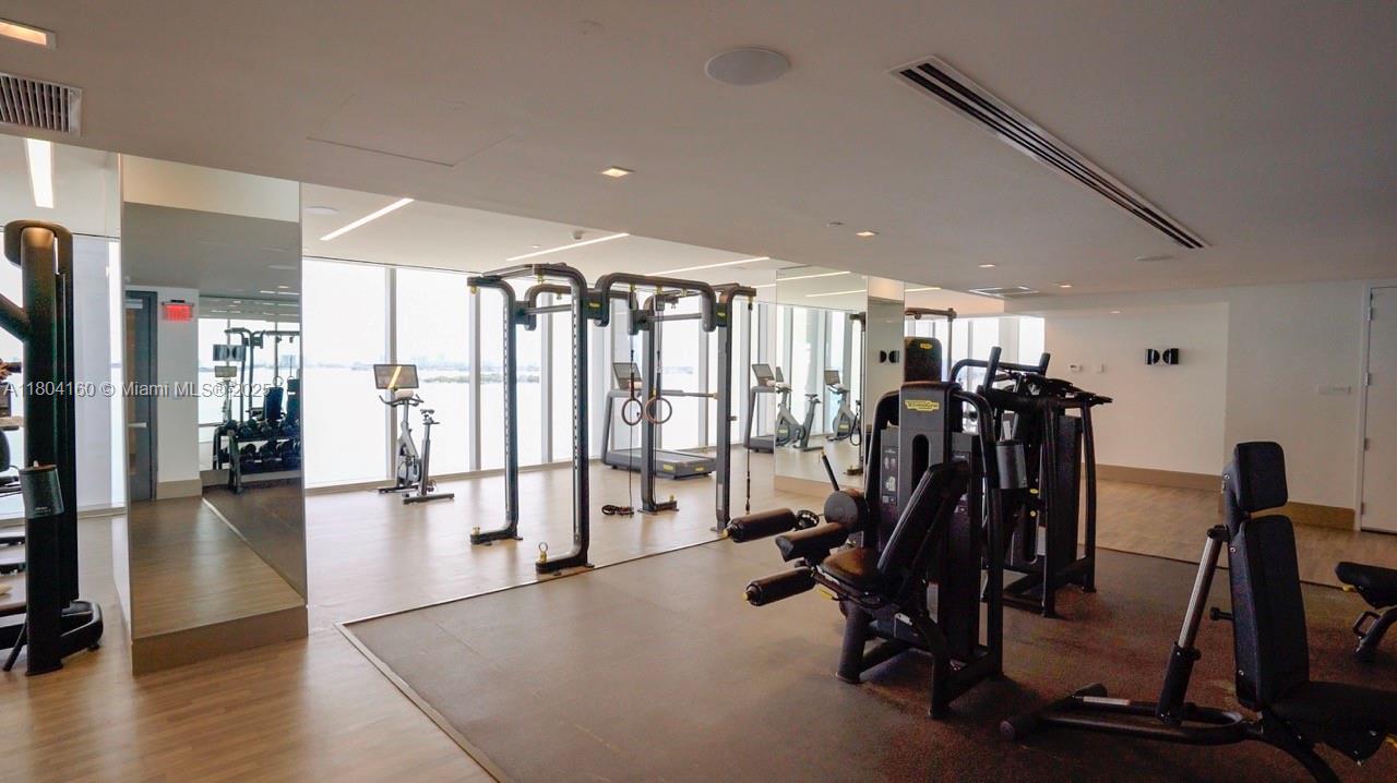 700 Northeast 26th Terrace, Unit 3903 Miami, FL 33137 - Photo 36 of 42 a view of a room with gym equipment